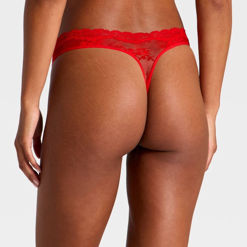 slide 3 of 3, Women's Lace Thong 3pk - Wild Fable™ Black/Red/Light Pink XL, 3 ct