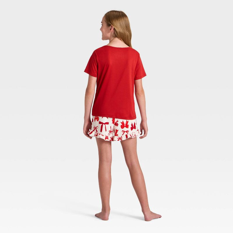 slide 2 of 4, Girls' 2pc Bows Short Sleeve Holiday Pajama Set - Cat & Jack™ Red L, 2 ct