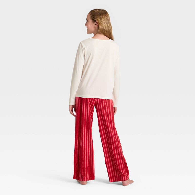 slide 2 of 4, Girls' 2pc Striped Adventure Graphic Long Sleeve Holiday Pajama Set - Cat & Jack™ Light Red S, 2 ct