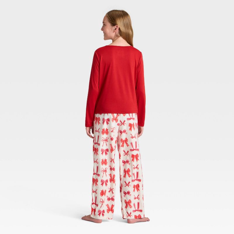 slide 2 of 5, Girls' 2pc Bows Long Sleeve Holiday Pajama Set - Cat & Jack™ Red L, 2 ct