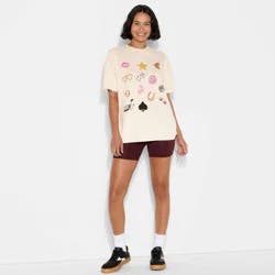 Women's Loose Fit Short Sleeve Crewneck Oversized Graphic T-Shirt - Wild Fable™ Beige Lips M