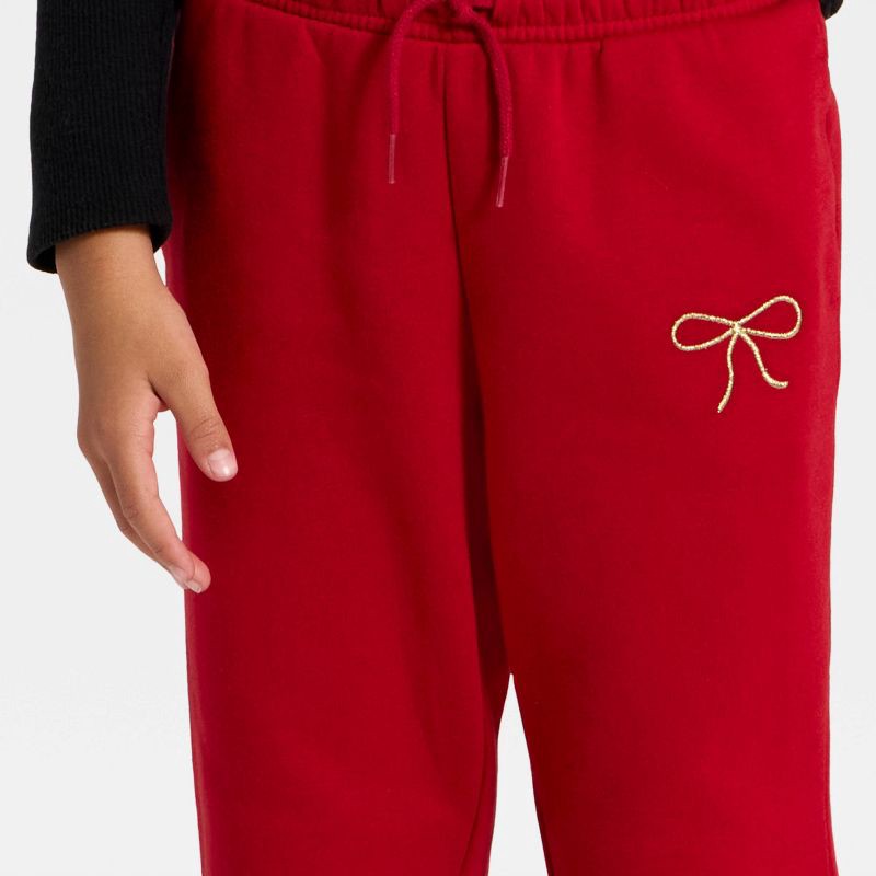 slide 2 of 4, Girls' Pull-On Bow Fleece Pants - Cat & Jack™ Dark Red L, 1 ct