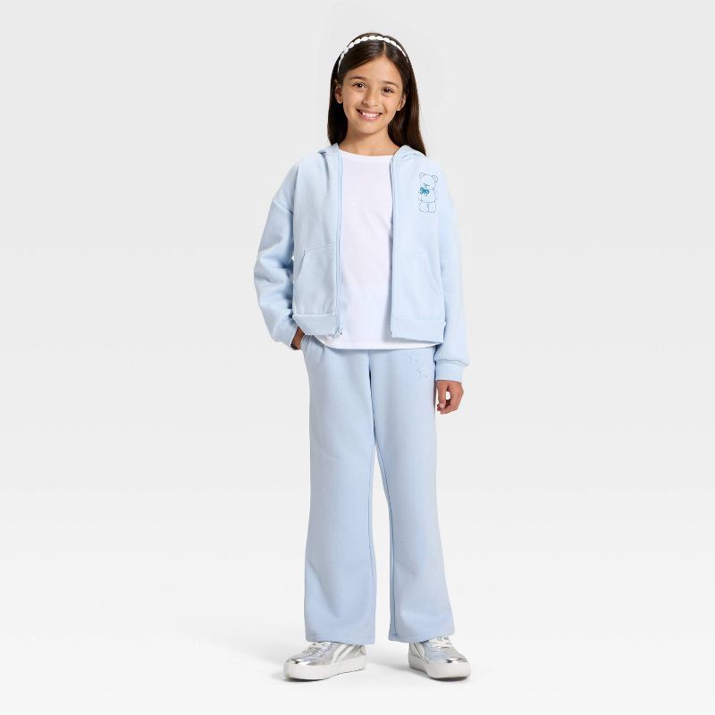 slide 4 of 4, Girls' Pull-On Star Fleece Pants - Cat & Jack™ Light Blue M, 1 ct