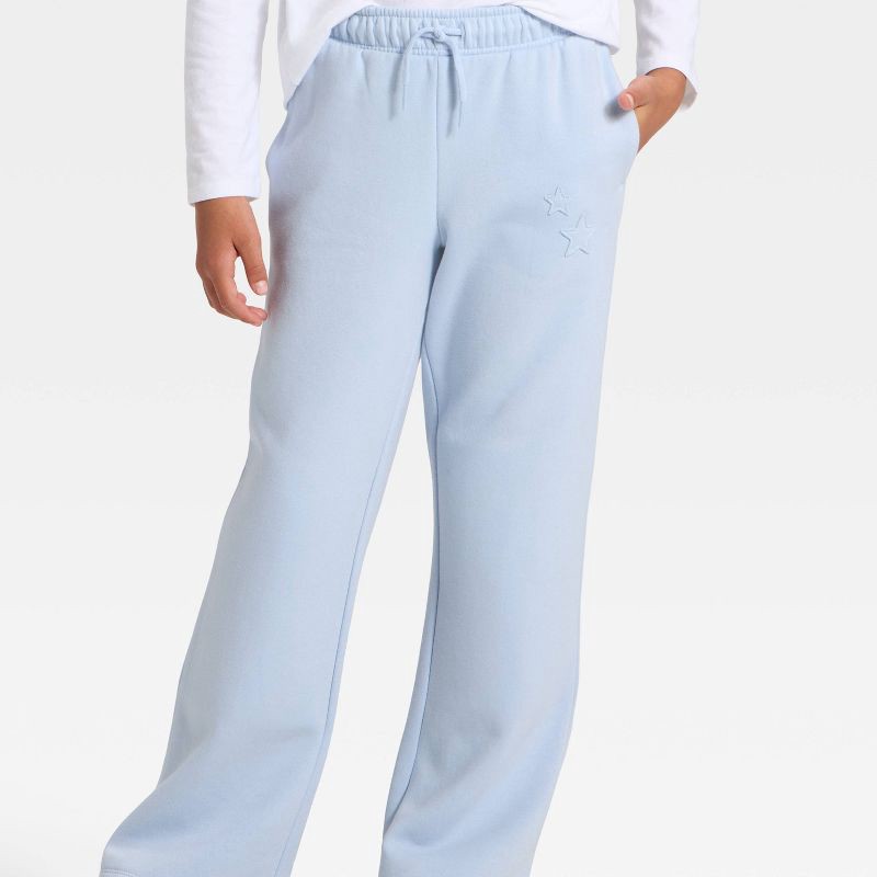 slide 2 of 4, Girls' Pull-On Star Fleece Pants - Cat & Jack™ Light Blue XL, 1 ct