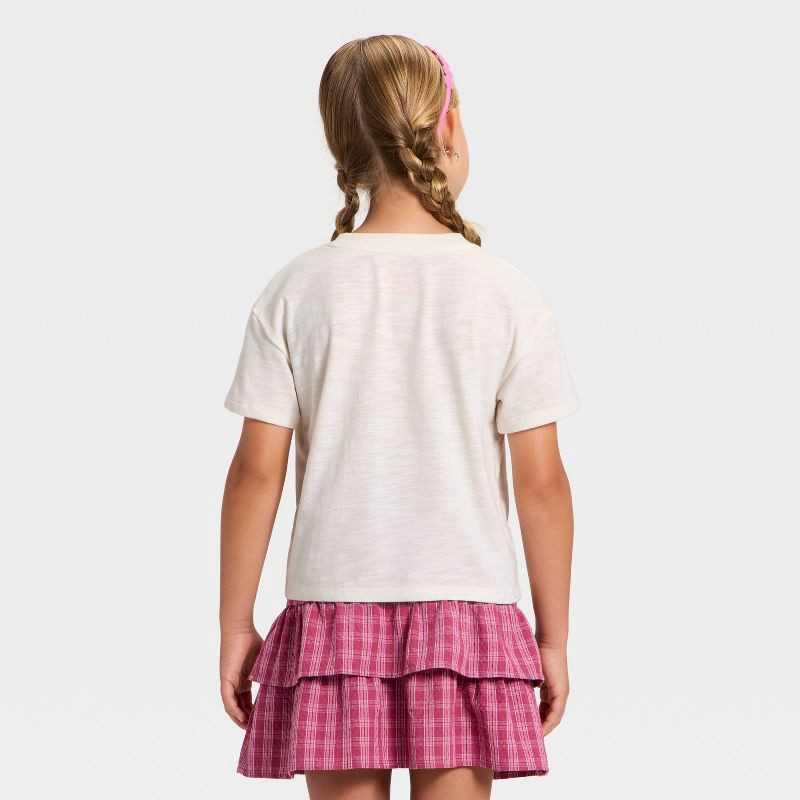 slide 3 of 4, Girls' Short Sleeve Pretzel Relaxed Fit Graphic T-Shirt - Cat & Jack™ Cream M, 1 ct