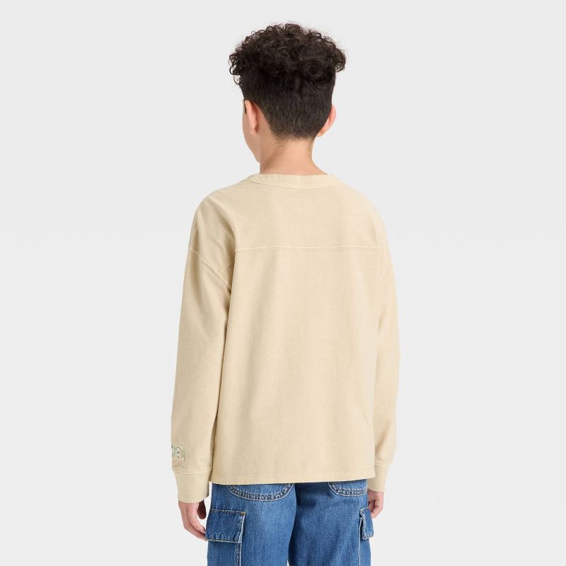 slide 2 of 3, Boys' Long Sleeve Oversized Fit Patch T-Shirt - Cat & Jack™ Light Beige M, 1 ct