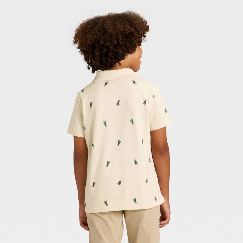slide 2 of 3, Boys' Short Sleeve Holiday Printed Polo Shirt - Cat & Jack™ Beige M, 1 ct
