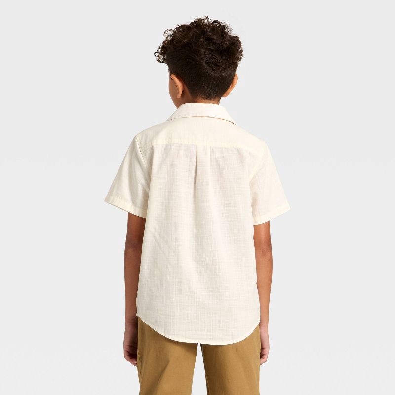 slide 2 of 3, Boys' Short Sleeve Chambray Button-Down Shirt - Cat & Jack™ Cream M, 1 ct