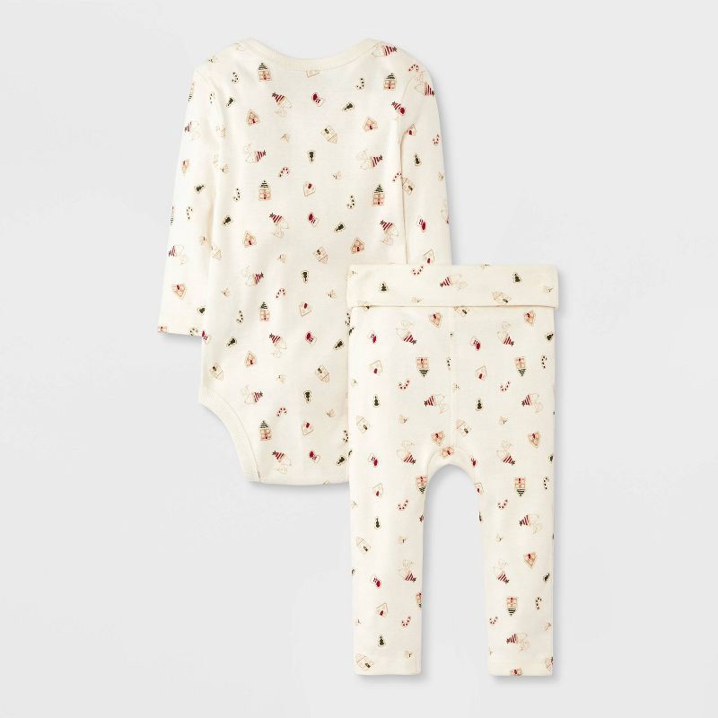 slide 2 of 4, Baby 2pc Peanuts Little Snoopy Christmas Bodysuit and Pants Set - Ivory 0-3M, 2 ct