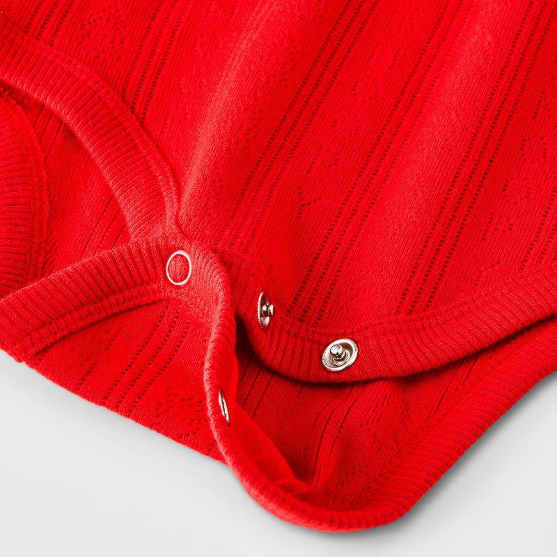 slide 3 of 4, Baby 2pc Peanuts Little Snoopy Christmas Bodysuit and Pants Set - Red/Green 3-6M, 2 ct