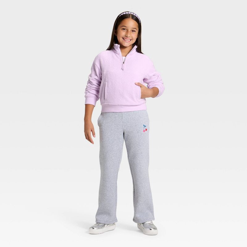 slide 3 of 3, Girls' Reverse Fleece Quarter Zip Pullover Sweatshirt - Cat & Jack™ Violet M, 1 ct