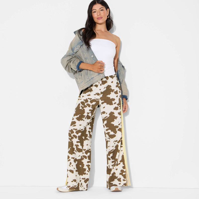 slide 1 of 3, Grayson Threads Women's Cow Print Pull-On Graphic Pants - Brown M, 1 ct