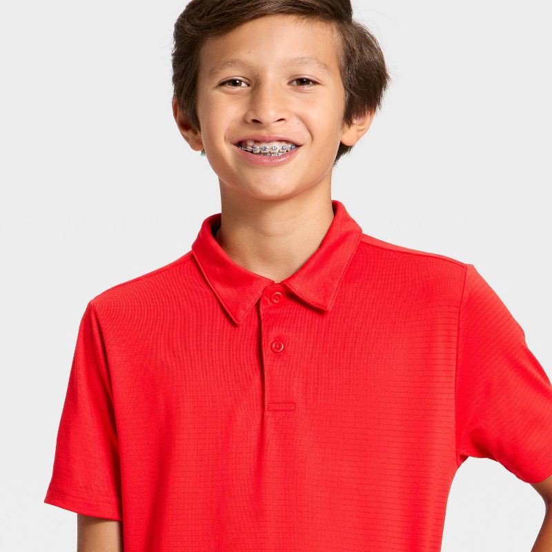 slide 3 of 3, Boys' Golf Polo Shirt - All In Motion™ Red XL, 1 ct