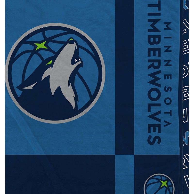 slide 2 of 3, NBA Minnesota Timberwolves 60"x70" Reverse Block Wordmark Double Sided Flannel Fleece Blanket, 1 ct