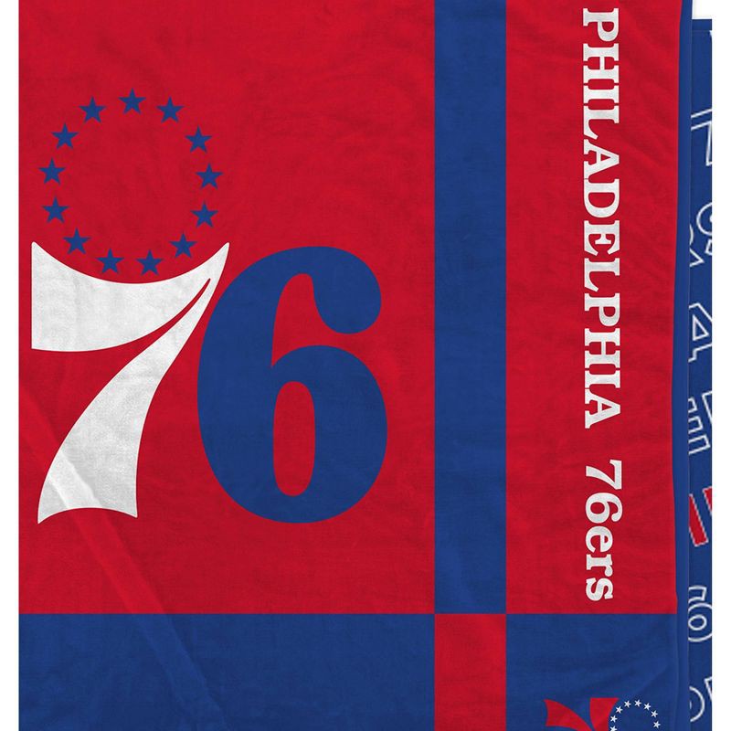 slide 2 of 3, NBA Philadelphia 76ers 60"x70" Reverse Block Wordmark Double Sided Flannel Fleece Blanket, 1 ct