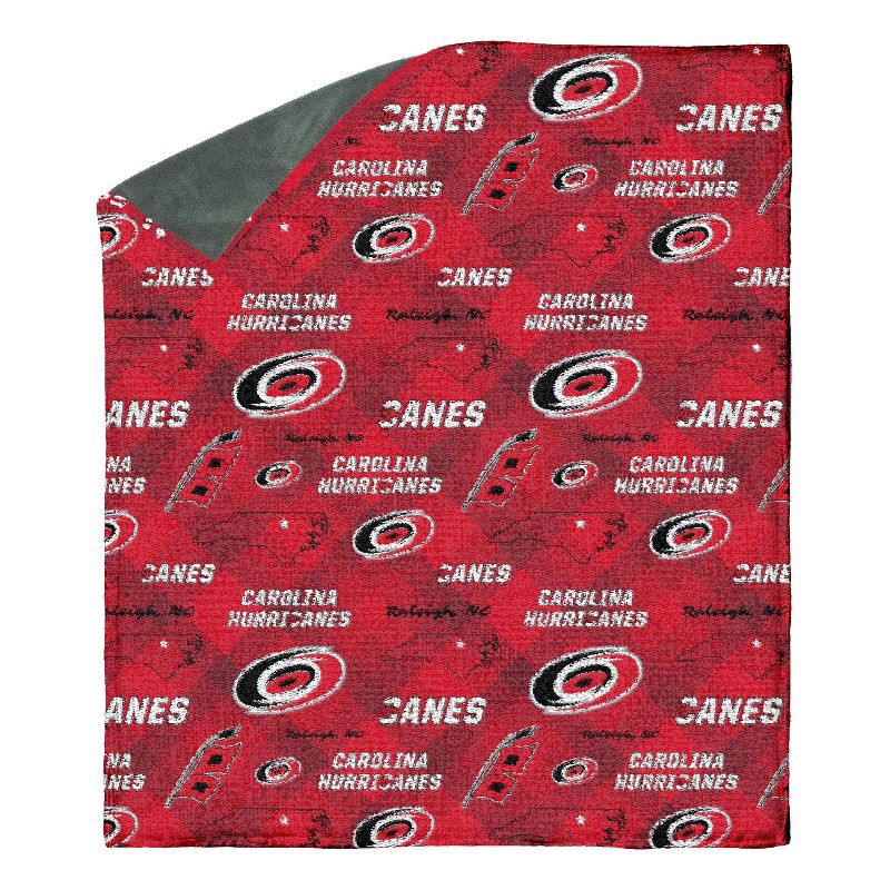 slide 2 of 3, NHL Carolina Hurricanes 60"x70" Uplift Chenille Throw Blanket, 1 ct