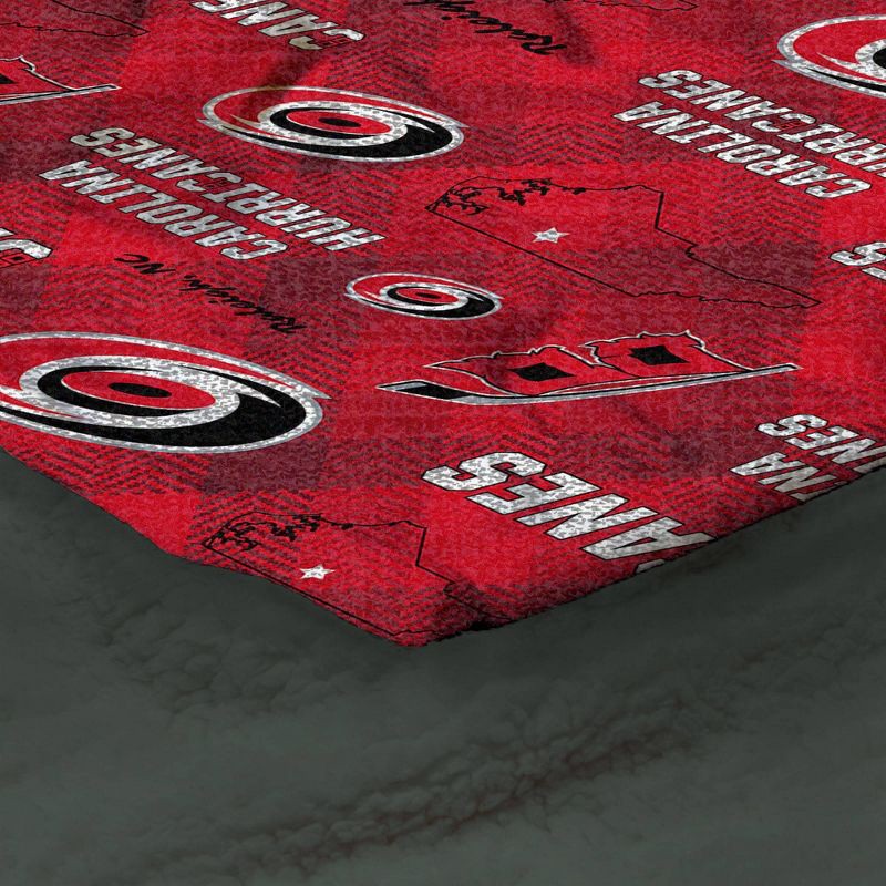 slide 3 of 3, NHL Carolina Hurricanes 60"x70" Uplift Chenille Throw Blanket, 1 ct
