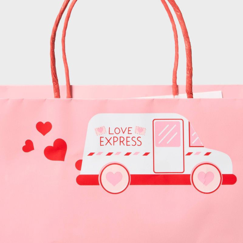 slide 3 of 3, Jumbo Valentine's Day Express Love Van Gift Bag Pink - Spritz™, 1 ct