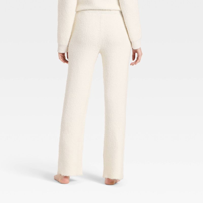 slide 2 of 3, Women's Mid-Rise Cozy Knit Ankle Pull-On Pants - Universal Thread™ Cream M, 1 ct