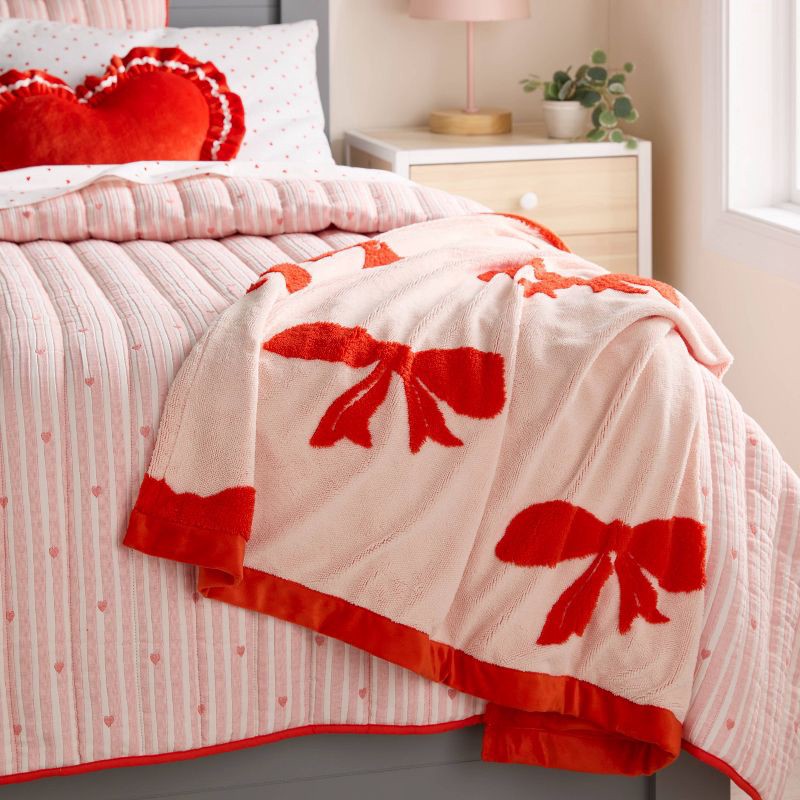 slide 2 of 3, Patisserie Bow Kids' Chenille Throw Blanket Pink - Pillowfort™, 1 ct