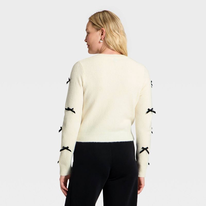 slide 2 of 3, Women's Long Sleeve Party Cardigan Sweater - A New Day™ Cream/Black M, 1 ct