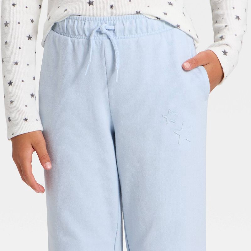 slide 2 of 4, Girls' Pull-On Star French Terry Pants - Cat & Jack™ Blue L, 1 ct