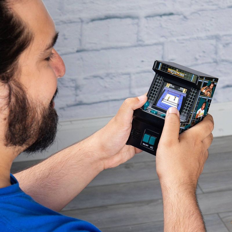slide 4 of 8, WWE Mini Arcade Classics TFT Handheld Electronic Game, 1 ct