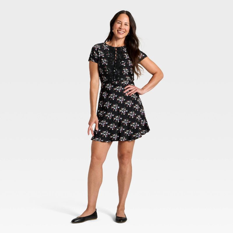 slide 3 of 3, Women's Short Sleeve Mini A-Line Dress - Universal Thread™ Black Floral XS, 1 ct