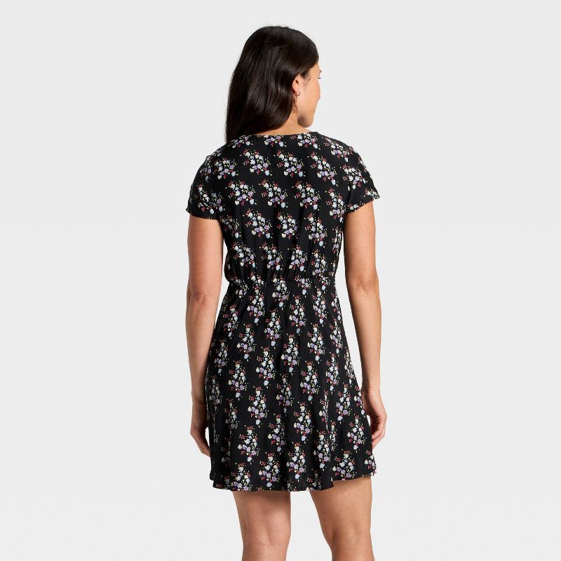 slide 2 of 3, Women's Short Sleeve Mini A-Line Dress - Universal Thread™ Black Floral S, 1 ct