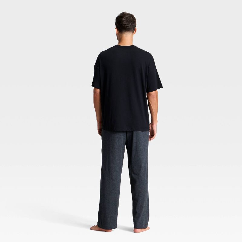 slide 2 of 3, Men's 2pc Short Sleeve T-Shirt & Pant Pajama Set - Goodfellow & Co™ Merry & Bright Black XL, 2 ct