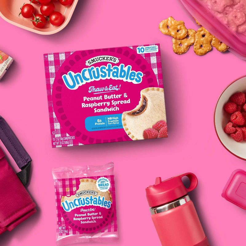slide 3 of 9, Smucker's Uncrustables Frozen Peanut Butter & Raspberry Spread Sandwich - 20oz/10ct, 10 ct; 20 oz