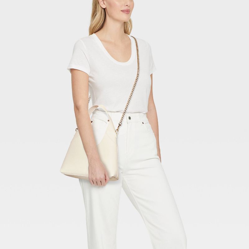 slide 2 of 5, Mini Slouchy Chain Handbag - Universal Thread™ Off-white, 1 ct