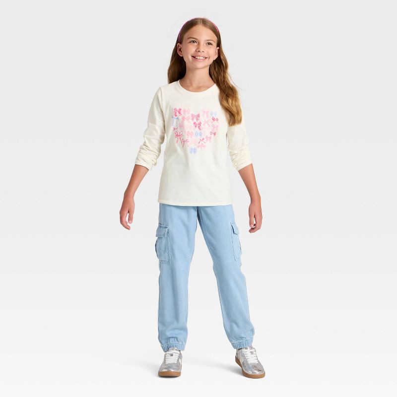 slide 4 of 4, Girls' Long Sleeve 'Bow Heart' Graphic T-Shirt - Cat & Jack™ Cream M, 1 ct