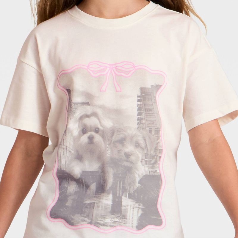 slide 2 of 4, Girls' Short Sleeve 'City Dogs' Oversized Graphic T-Shirt - Cat & Jack™ Cream XS, 1 ct