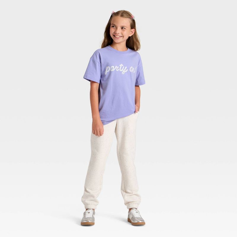 slide 4 of 4, Girls' Short Sleeve 'Party On' Oversized Graphic T-Shirt - Cat & Jack™ Purple XS, 1 ct