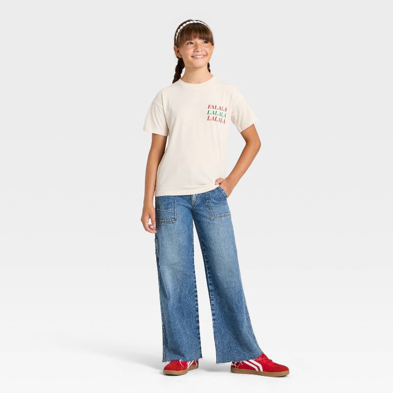 slide 4 of 4, Girls' Short Sleeve Christmas 'Falala' Oversized Graphic T-Shirt- Cat & Jack™ Beige L, 1 ct