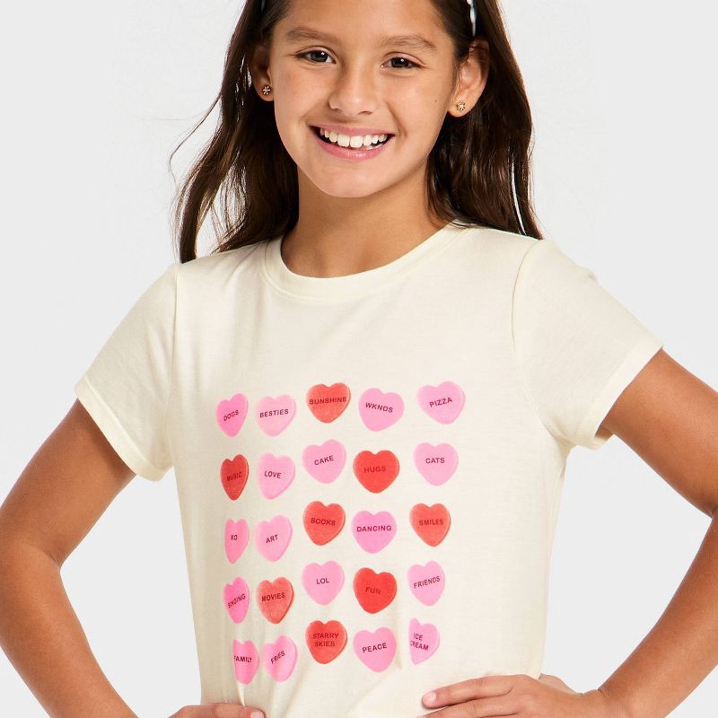 slide 2 of 4, Girls' Short Sleeve Valentine's Day 'Candy Hearts' Graphic T-Shirt - Cat & Jack™ Cream M, 1 ct