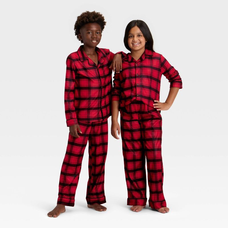 slide 1 of 5, Kids' Plaid Long Sleeve Shirt and Pants Holiday Matching Family Pajama Set - Wondershop™ Red/Black M, 1 ct