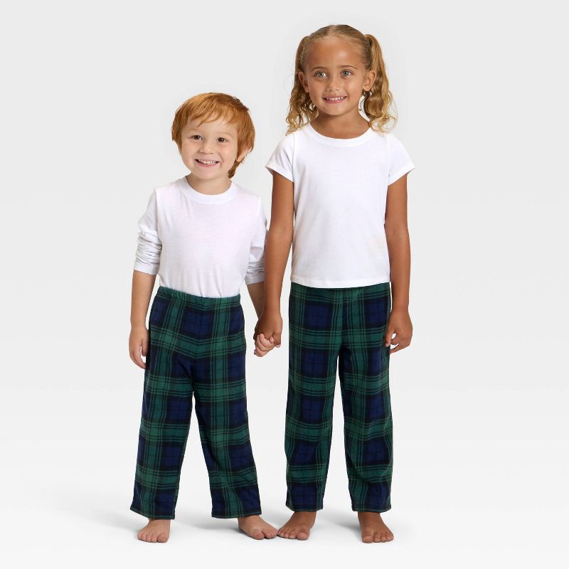 slide 1 of 4, Toddler Plaid Microfleece Holiday Matching Family Pajama Pants - Wondershop™ Navy Blue 12M, 1 ct