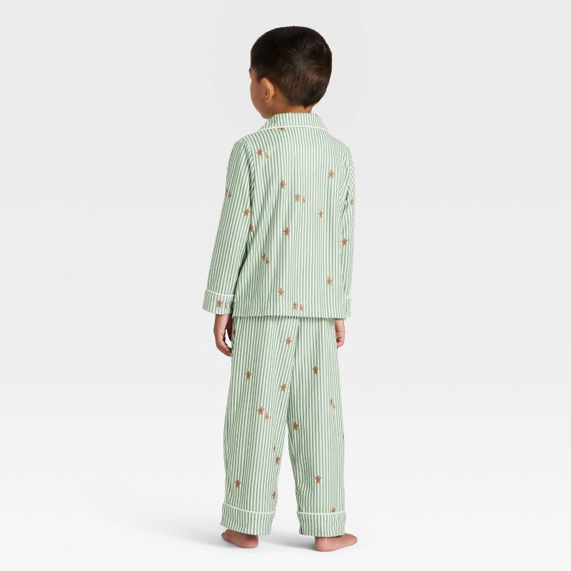 slide 2 of 5, Toddler Gingerbread Striped Long Sleeve Shirt and Pants Holiday Matching Family Pajama Set - Wondershop™ Cream 12M, 1 ct