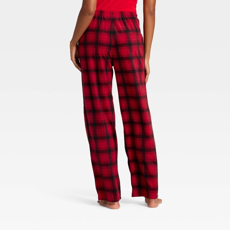 slide 2 of 4, Women's Plaid Microfleece Holiday Matching Family Pajama Pants - Wondershop™ Red/Black XS, 1 ct