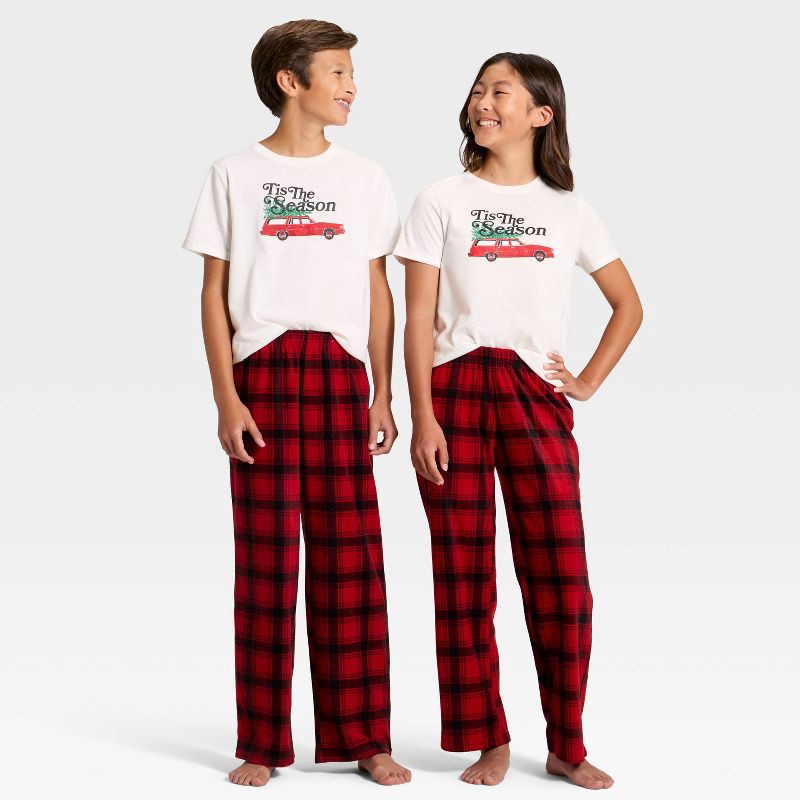 slide 1 of 4, Kids' Plaid Microfleece Holiday Matching Family Pajama Pants - Wondershop™ Red/Black L, 1 ct