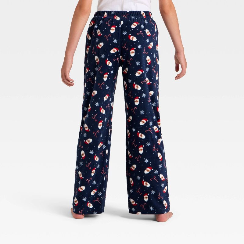 slide 3 of 3, Kids' Santa Print Microfleece Holiday Matching Family Pajama Pants - Wondershop™ Blue M, 1 ct