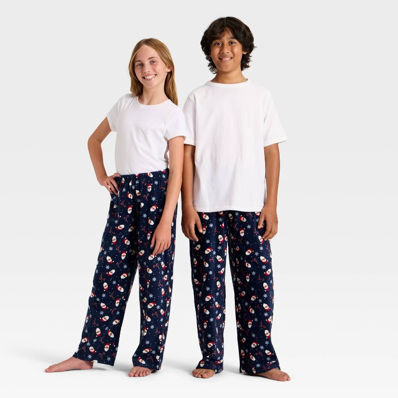 slide 1 of 3, Kids' Santa Print Microfleece Holiday Matching Family Pajama Pants - Wondershop™ Blue M, 1 ct