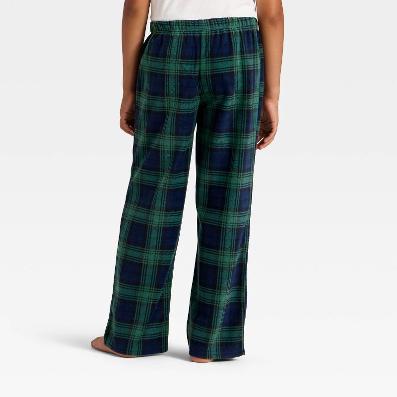 slide 3 of 4, Kids' Plaid Microfleece Holiday Matching Family Pajama Pants - Wondershop™ Navy Blue XS, 1 ct