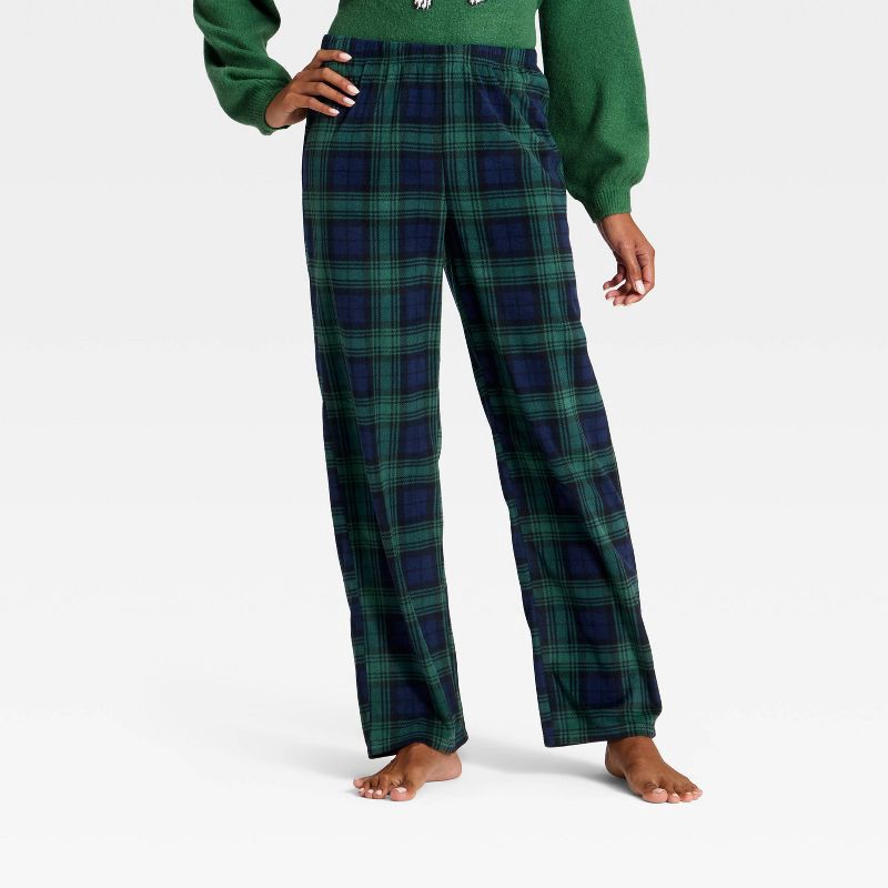 slide 1 of 4, Women's Plaid Microfleece Holiday Matching Family Pajama Pants - Wondershop™ Navy Blue S, 1 ct