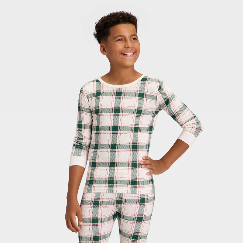 slide 3 of 5, Kids' Plaid Ribbed Long Sleeve Shirt and Pants Holiday Matching Family Pajama Set - Wondershop™ Cream 10, 1 ct