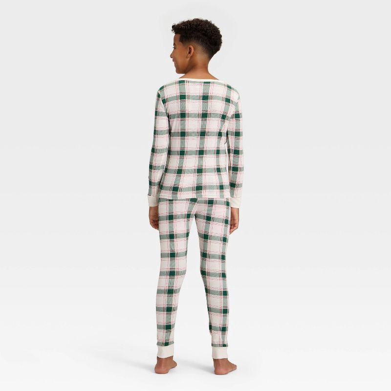 slide 2 of 5, Kids' Plaid Ribbed Long Sleeve Shirt and Pants Holiday Matching Family Pajama Set - Wondershop™ Cream 12, 1 ct