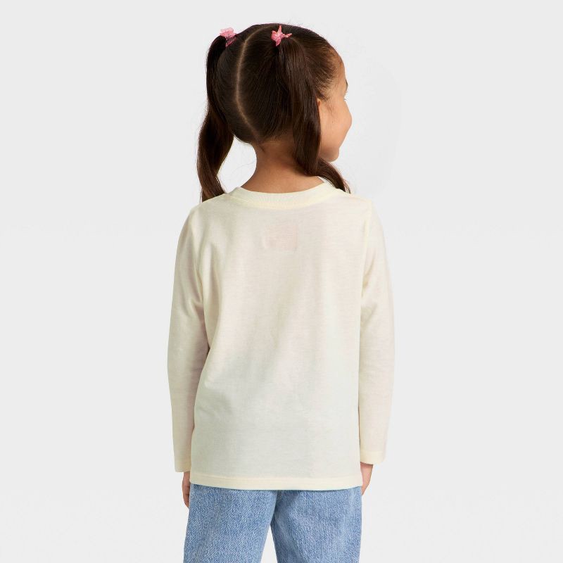 slide 2 of 3, Toddler Girls' Long Sleeve Graphic T-Shirt - Cat & Jack™ Cream 4T, 1 ct