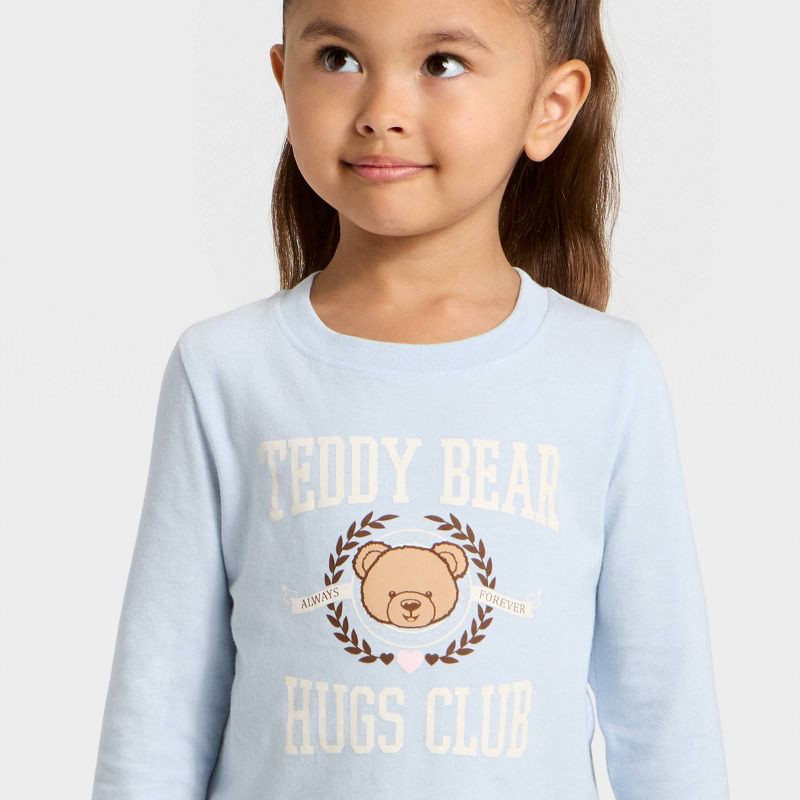 slide 2 of 4, Toddler Girls' Long Sleeve Graphic T-Shirt - Cat & Jack™ Light Blue 12M, 1 ct